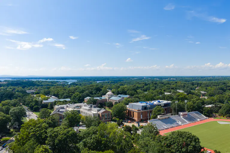 Wide aerial of the Davidson College campus with the solar canopies below